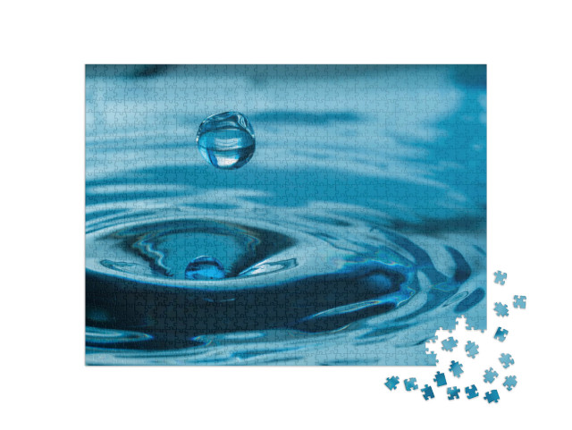Puzzle 1000 Teile „Wassertropfen spritzen in ein Glas “