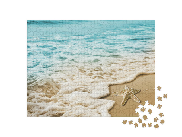 Puzzle 1000 Teile „Seestern in den weichen Wellen am Meeresufer“