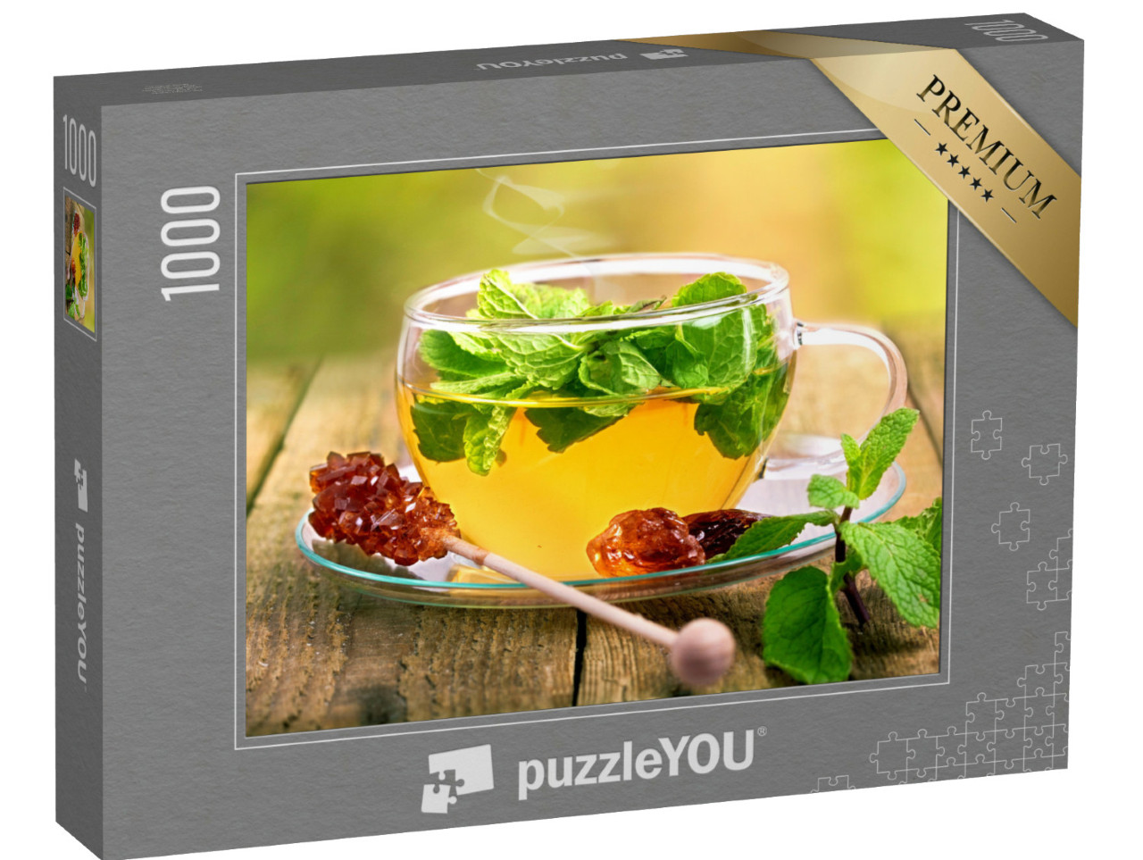 Puzzle 1000 Teile „Tee in Glastasse mit Minzblatt und braunem Rohrzucker“