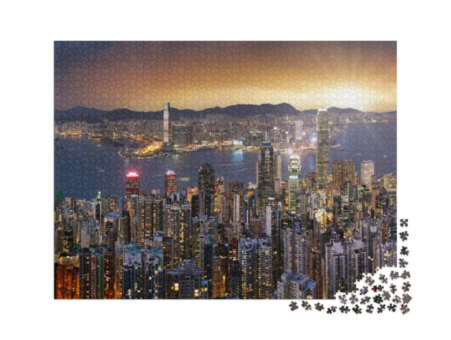 Puzzle 2000 Teile „Panorama der Skyline von Hongkong im Sonnenuntergang“