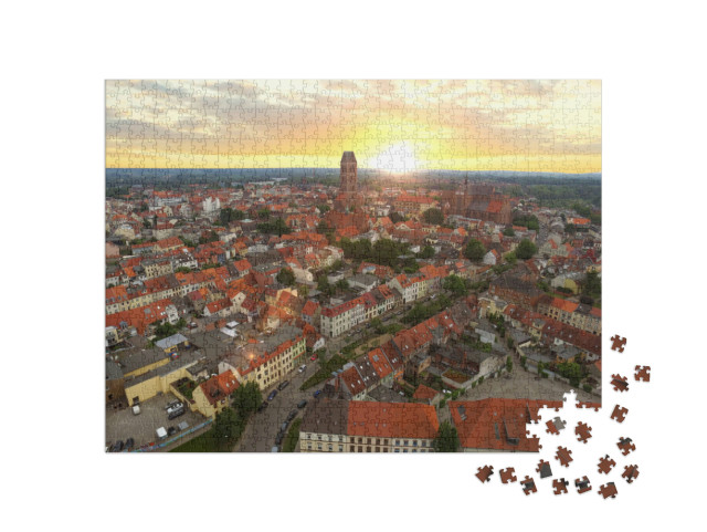 Puzzle 1000 Teile „ Historische Hansestadt Wismar im Sonnenuntergang“
