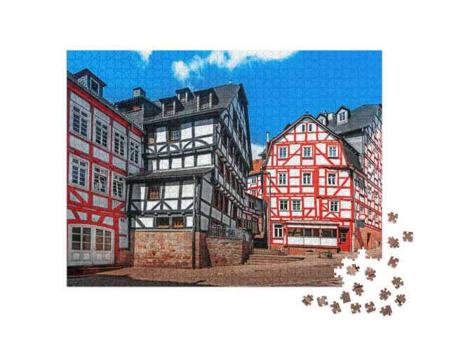 Puzzle 1000 Teile „Historische Fachwerkhäuser in der Altstadt von Marburg“