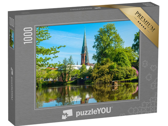 Puzzle 1000 Teile „Blick auf den Teich und die St. Lamberti Kirche in Oldenburg, Deutschland“