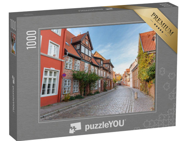 Puzzle 1000 Teile „Straße mit mittelalterlichen alten Backsteinbauten, Lüneburg, Deutschland“