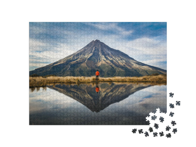 Puzzle 1000 Teile „Bergsteiger am Vulkan Taranaki, Neuseeland“
