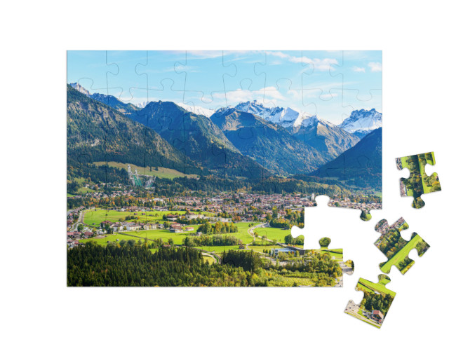 Puzzle 48 Teile „Panoramablick auf Oberstdorf im Allgäu“