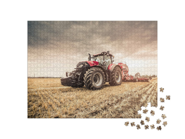Puzzle 1000 Teile „Roter Traktor bei der Feldarbeit“