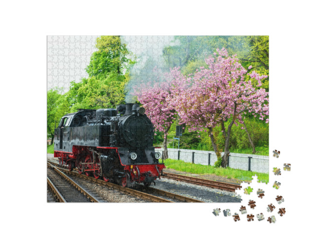 Puzzle 1000 Teile „Mollie-Dampfzug in Warnemünde, Deutschland“