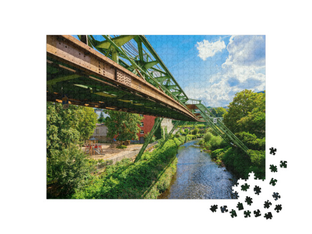 Puzzle 1000 Teile „Schwebebahn in Wuppertal, Deutschland“