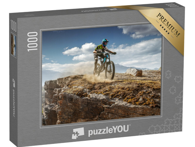 Puzzle 1000 Teile „Mountainbiker über dem Abhang“