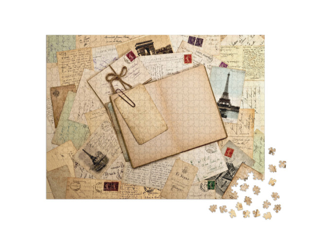 Puzzle 1000 Teile „Alte Briefe, Postkarten und leeres offenes Buch“