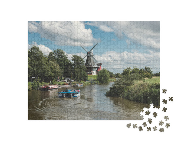 Puzzle 1000 Teile „Windmühlen am alten Greetsieler Sieltief, Niedersachsen“