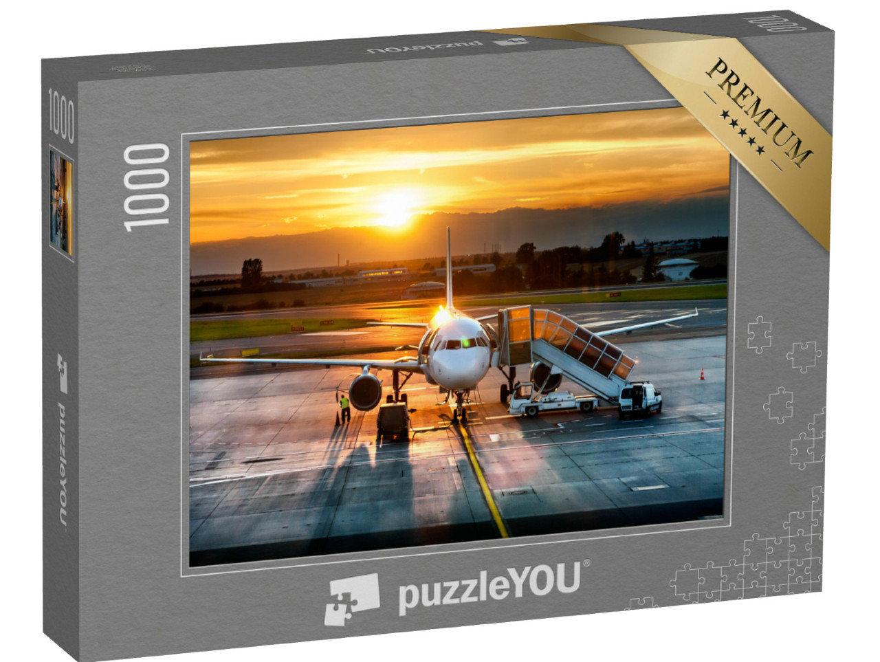 Puzzle 1000 Teile „Passagierflugzeug auf der Landebahn im Sonnenuntergang“