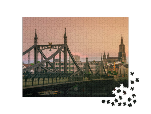 Puzzle 1000 Teile „Die Brücke Neutor und Ulmer Münster im Sonnenuntergang“