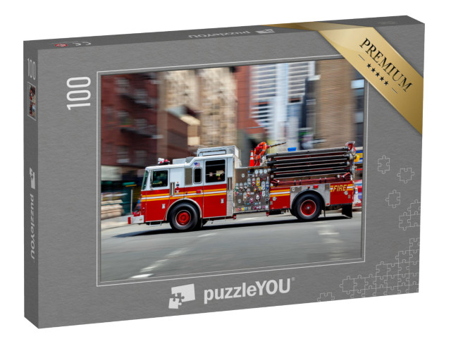Puzzle 100 Teile „Feuerwehrauto auf dem Weg zum Einsatz in NYC“