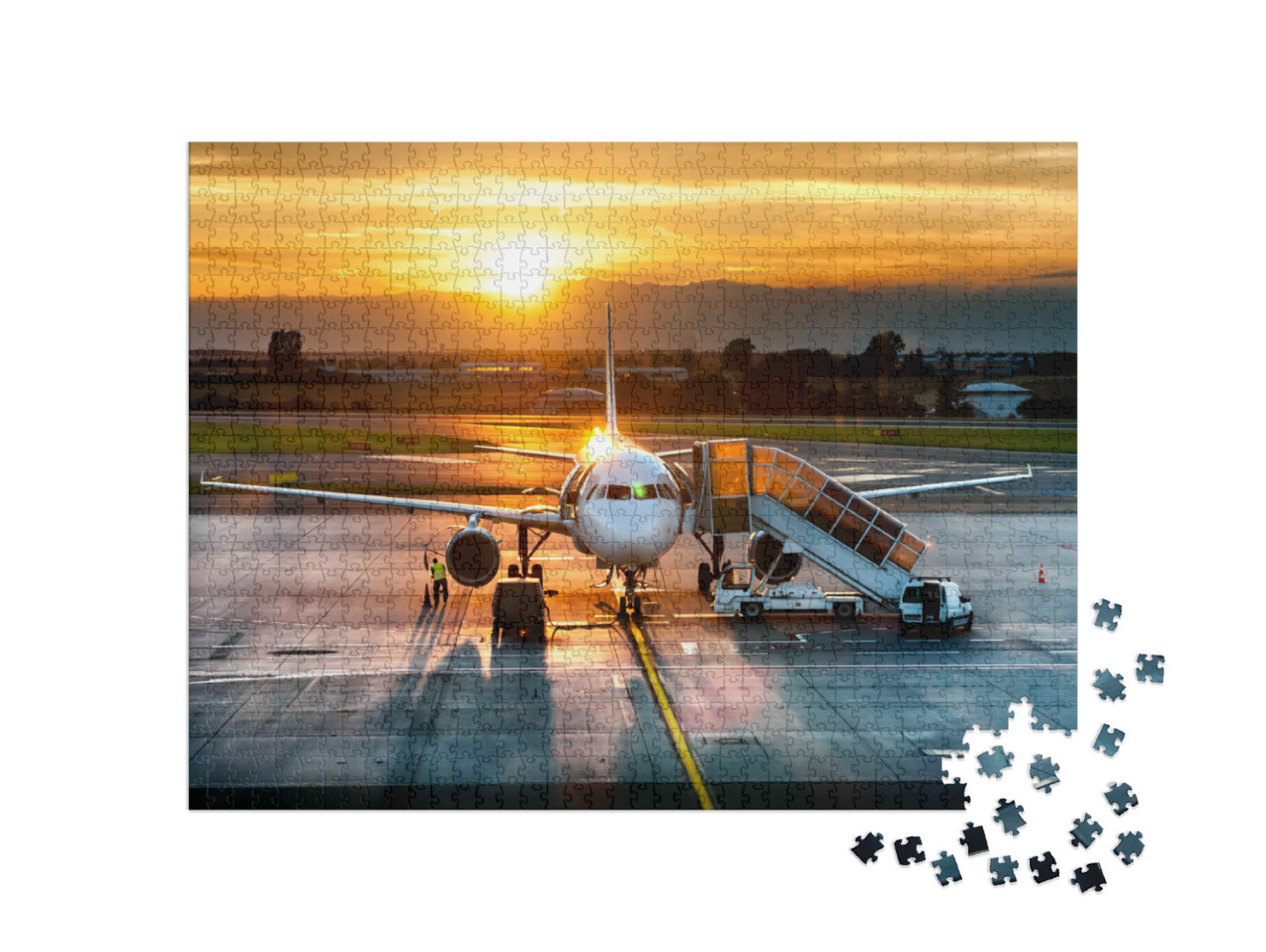 Puzzle 1000 Teile „Passagierflugzeug auf der Landebahn im Sonnenuntergang“