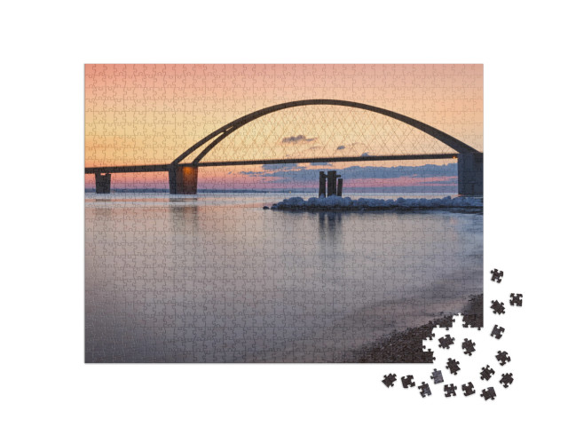 Puzzle 1000 Teile „Fehmarnsundbrücke im schönen Sonnenuntergang“