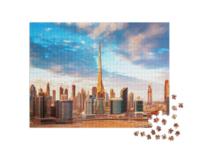 Puzzle 1000 Teile „Blick bei Sonnenuntergang auf die Skyline von Dubai“