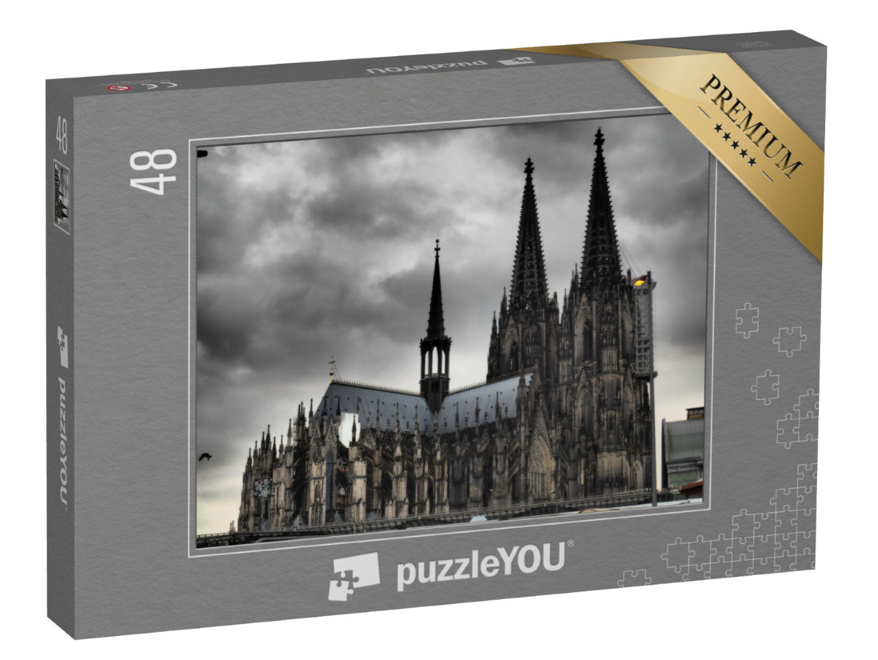 Puzzle 48 Teile „Kölner Dom unter dunkeln Wolken“