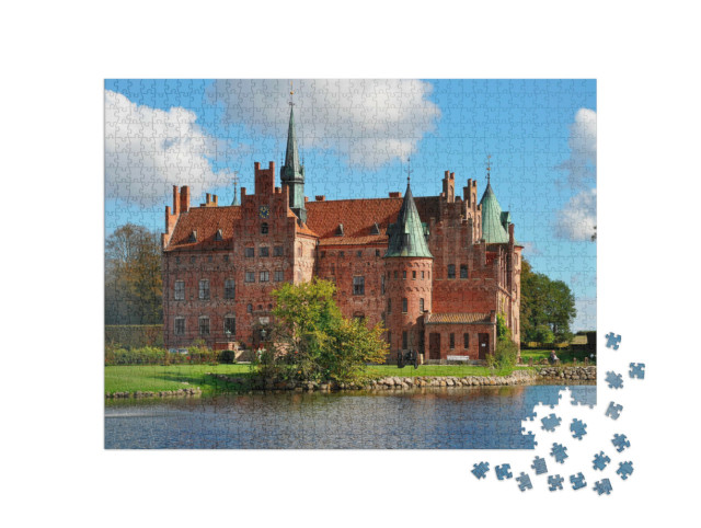 Puzzle 1000 Teile „Schloss Egeskov, ein märchenhaftes Wahrzeichen in Dänemark“