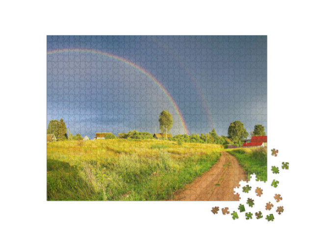 Puzzle 1000 Teile „Regenbogen über dunklen Regenwolken in ländlicher Landschaft“