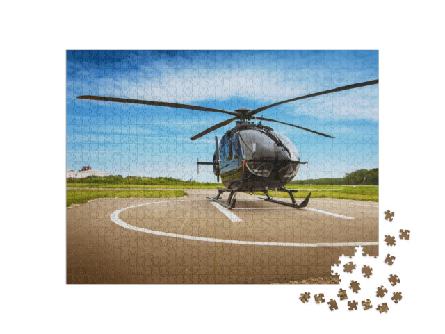 Puzzle 1000 Teile „Hubschrauber auf dem Hubschrauberlandeplatz“