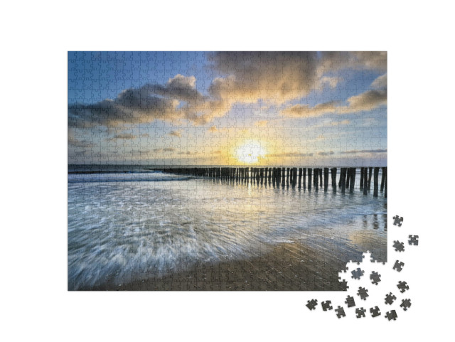 Puzzle 1000 Teile „Stürmischer Sonnenuntergang an der Nordseeküste“
