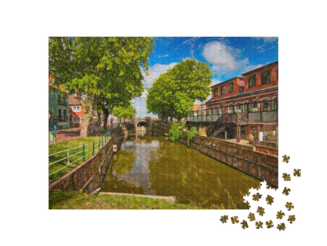 Puzzle 1000 Teile „Kanal zur alten Schleuse in Greetsiel, Deutschland“