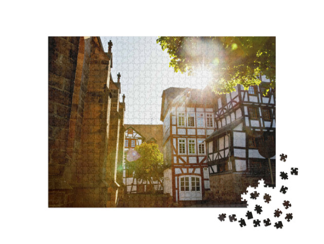 Puzzle 1000 Teile „Wunderschöne Fachwerkhäuser in der Altstadt von Marburg“