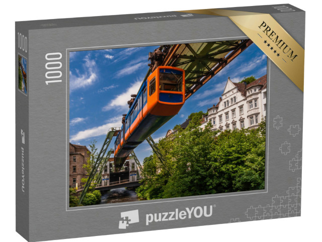 Puzzle 1000 Teile „Die Schwebende Straßenbahn in Wuppertal“