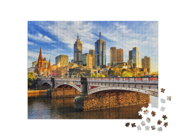Puzzle 1000 Teile „Morgen über den Hochhäusern von Melbourne“