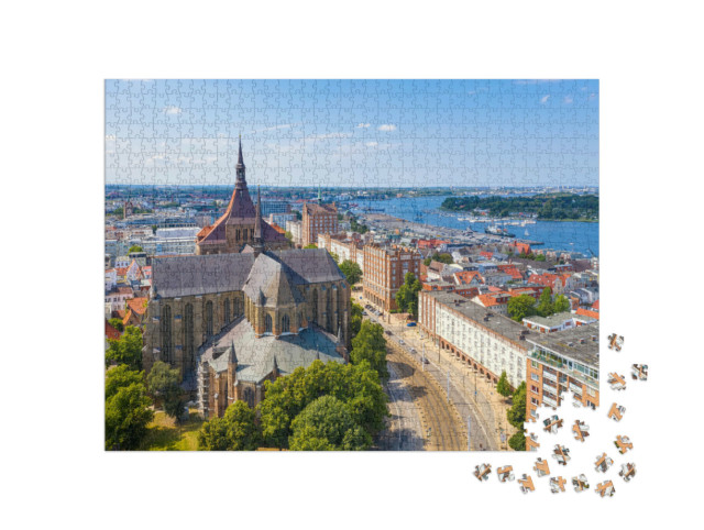 Puzzle 1000 Teile „Blick über Rostock, Deutschland“