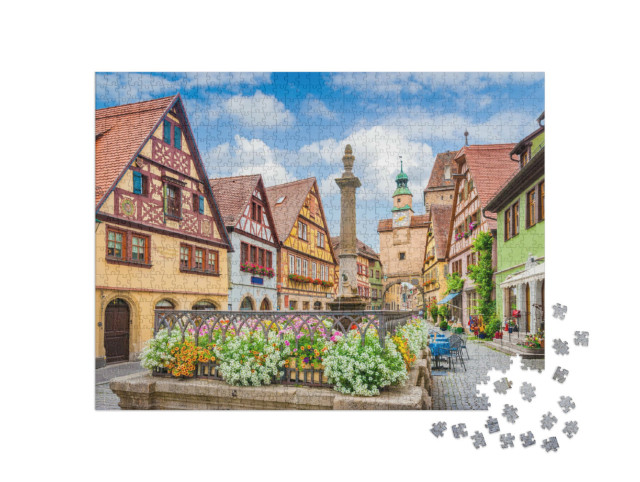 Puzzle 1000 Teile „Rothenburg ob der Tauber im Sommer mit blauem Himmel“