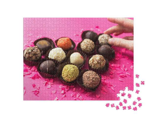Puzzle 1000 Teile „Romantik am Valentinstag: Ein Herz aus Schokoladenpralinen“