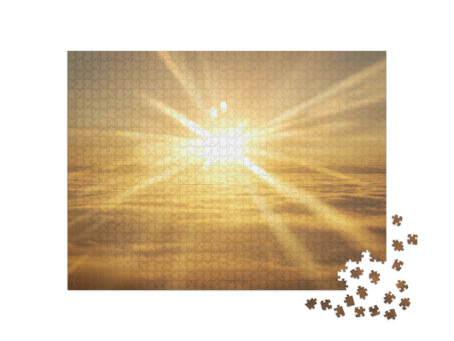 Puzzle 1000 Teile „Sonnenuntergang über den Wolken“