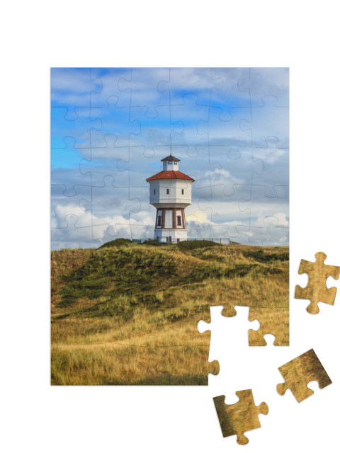 Puzzle 48 Teile „Leuchtturm auf der Insel Langeoog, Niedersachsen“