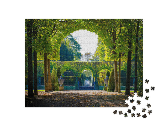Puzzle 1000 Teile „Grüne Bäume im Schwetzinger Schlossgarten, Baden Württemberg“