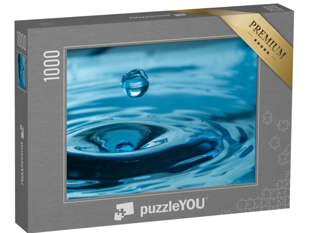 Puzzle 1000 Teile „Wassertropfen spritzen in ein Glas “