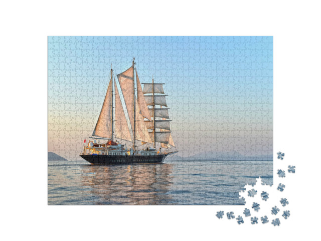 Puzzle 1000 Teile „Segelyacht bei Sonnenuntergang auf dem Meer“