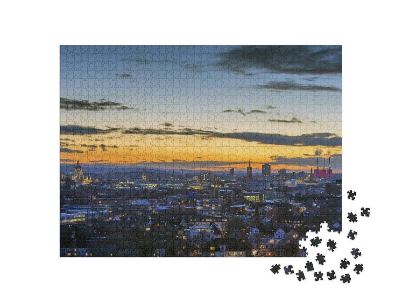 Puzzle 1000 Teile „Luftbildaufnahme von Hannover am Abend“