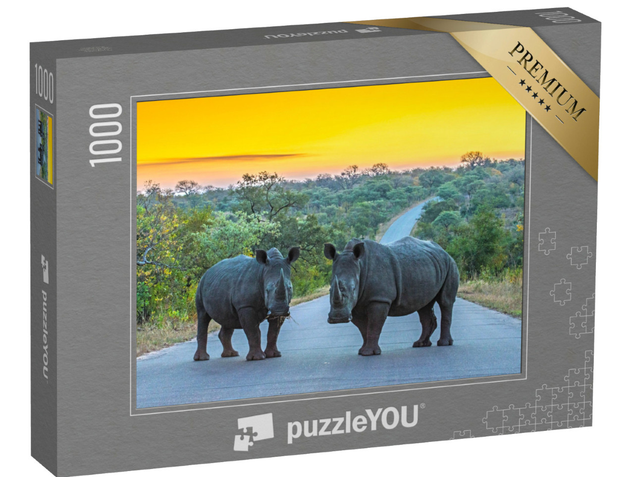 Puzzle 1000 Teile „Zwei Nashörner auf einer Straße bei Sonnenuntergang, Kruger Nationalpark, Südafrika“