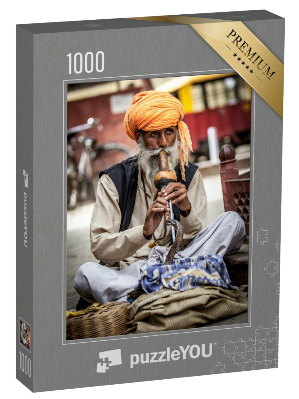 Puzzle 1000 Teile „Schlangenbeschwörer an einer Straße in Indien“