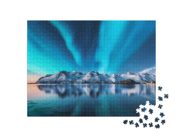 Puzzle 1000 Teile „Nordlicht und schneebedeckte Berge auf den Lofoten, Norwegen“