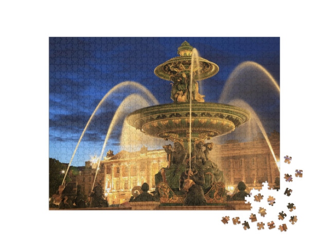 Puzzle 1000 Teile „Springbrunnen auf dem Place de la Concorde am Abend, Paris, Frankreich“
