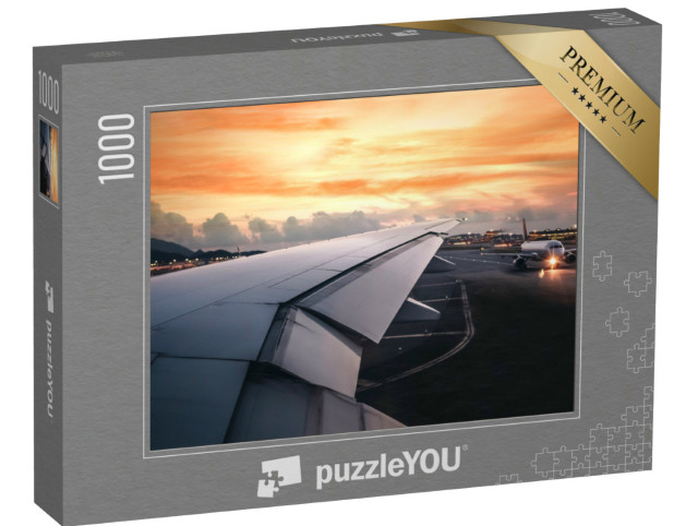 Puzzle 1000 Teile „Sonnenuntergang am Flughafen“