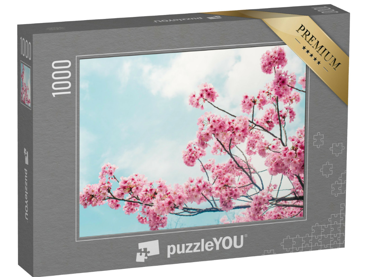 Puzzle 1000 Teile „Bezaubernde blühende Kirschzweige unter blauem Himmel“