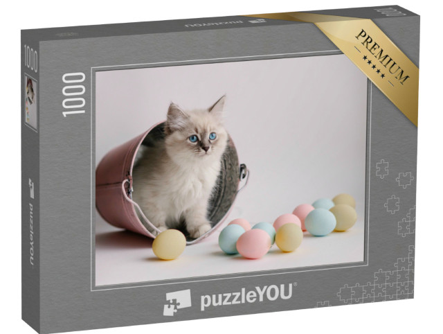 Puzzle 1000 Teile „Eine Katze im Eimer mit bunten Ostereiern“