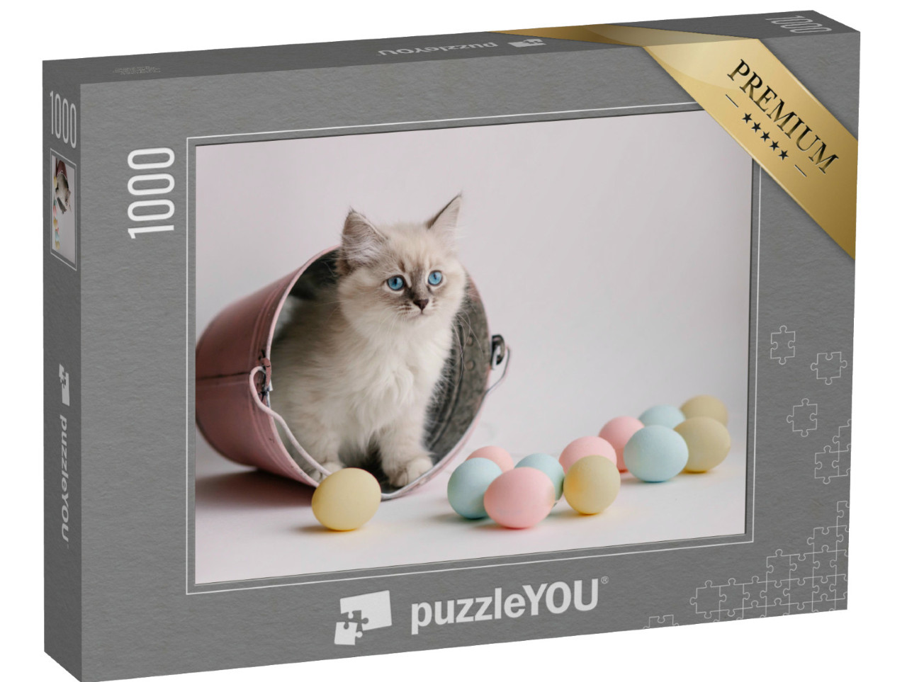 Puzzle 1000 Teile „Eine Katze im Eimer mit bunten Ostereiern“