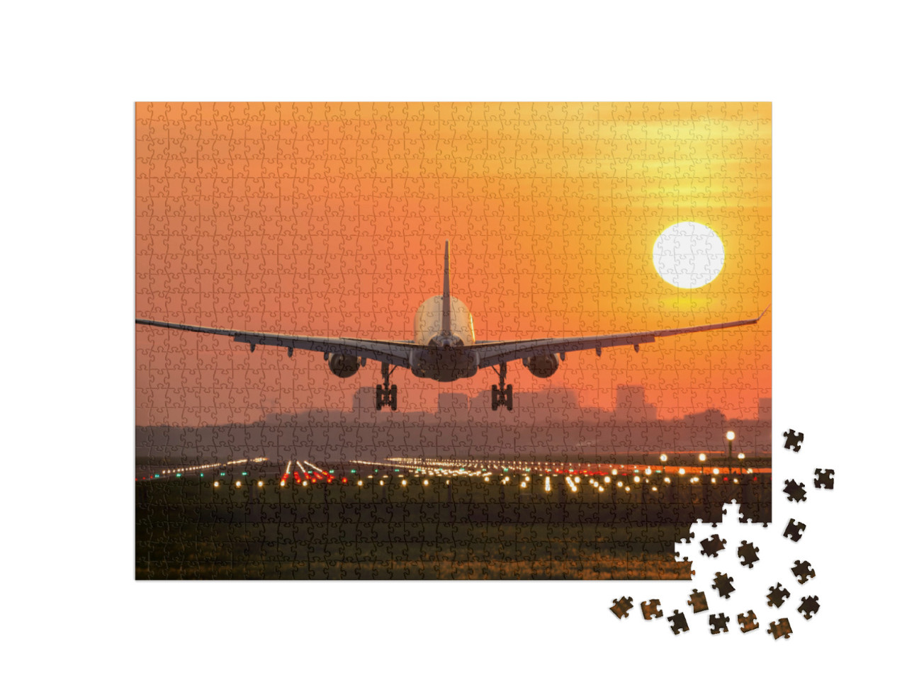 Puzzle 1000 Teile „Passagierflugzeug bei der Landung im Sonnenuntergang“