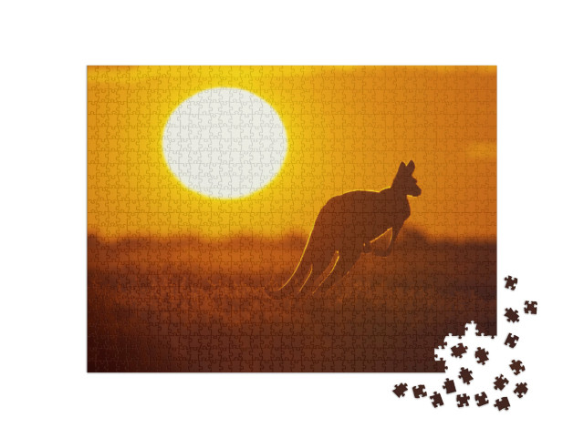 Puzzle 1000 Teile „Känguru im glühenden australischen Sonnenuntergang“